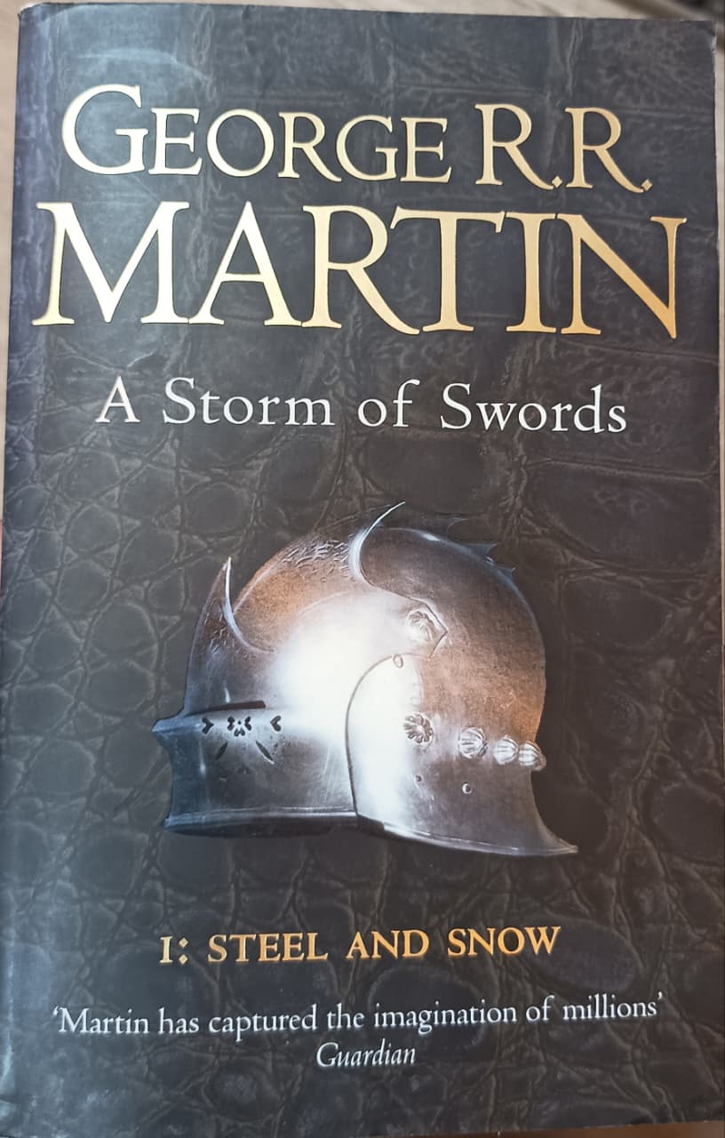 A STORM OF SWORDS steel and snow BY GEORGE RR MARTIN (GRADE - B)