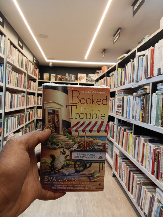 Booked for Trouble
Book by Eva Gates