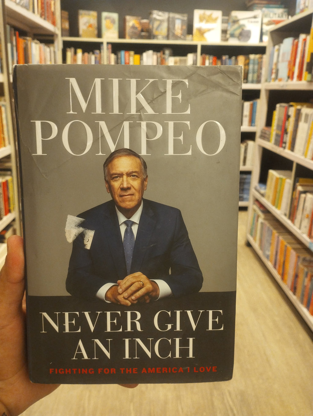 NEVER GIVE AN INCH ( HARDCOVER)(Grade:B)